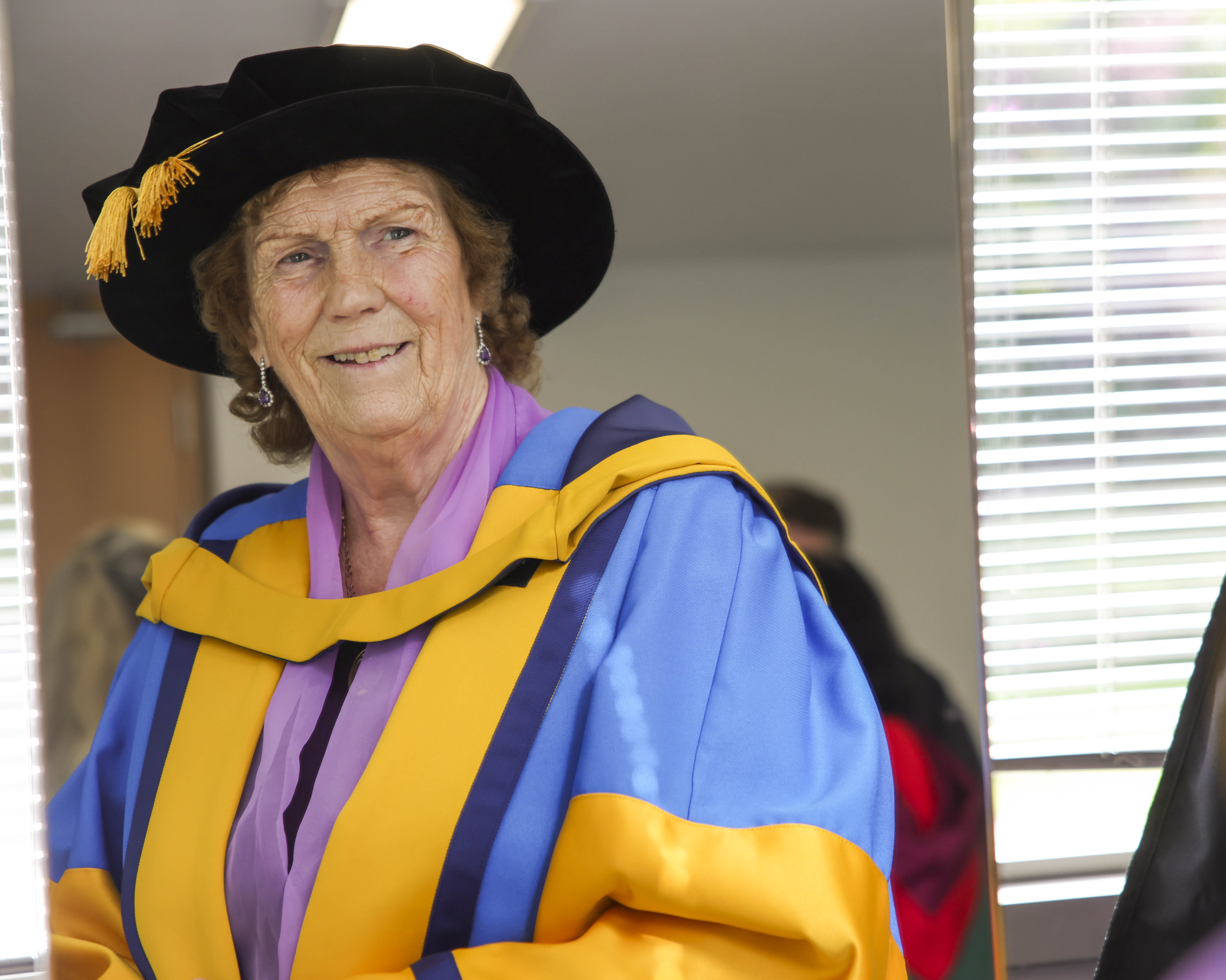 Missie Collins in academic robes