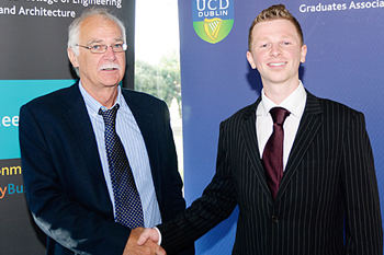 Winner of the 2012 Pat McAdam Scholarship,Karl Brennan, congratulated by Dr Dermot Malone.