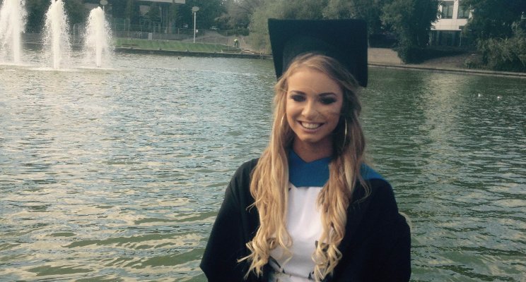 Harriet Walsh on front of one of UCD's lakes