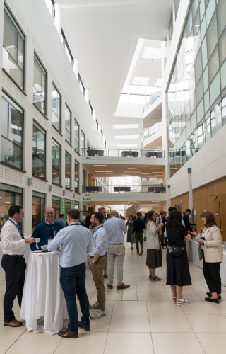 Attendees of research retreat 2024 mingling at the venue